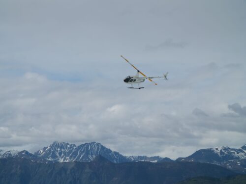 helicopter and mountains