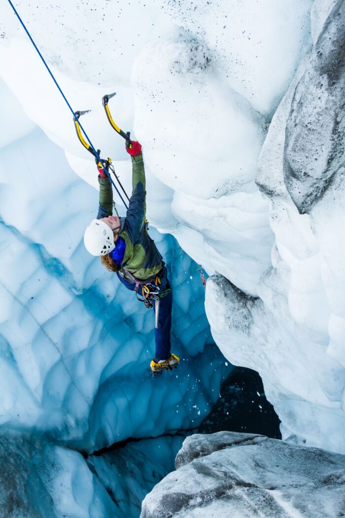 ice climber on blue ice