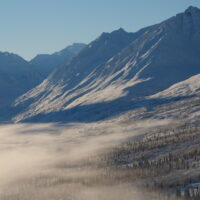 bluebird day snow covered mountains in Alaska